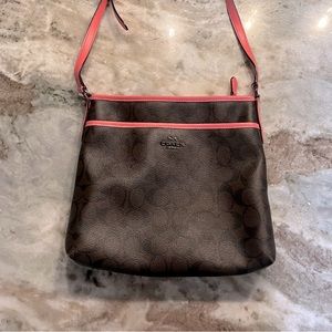 Coach crossbody purse. Brown with pink trim and strap.